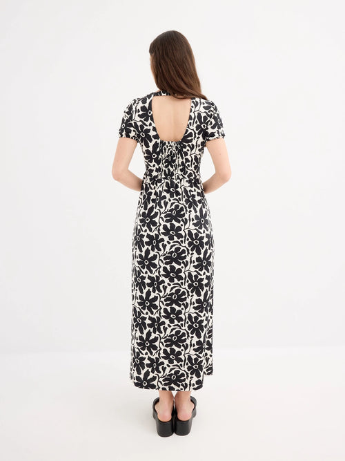 Maxi printed dress with V-neck and short sleeves by Inside, made from soft polyester-elastane blend, featuring button front closure and partially exposed back, perfect for casual everyday wear, ideal for women looking for sty