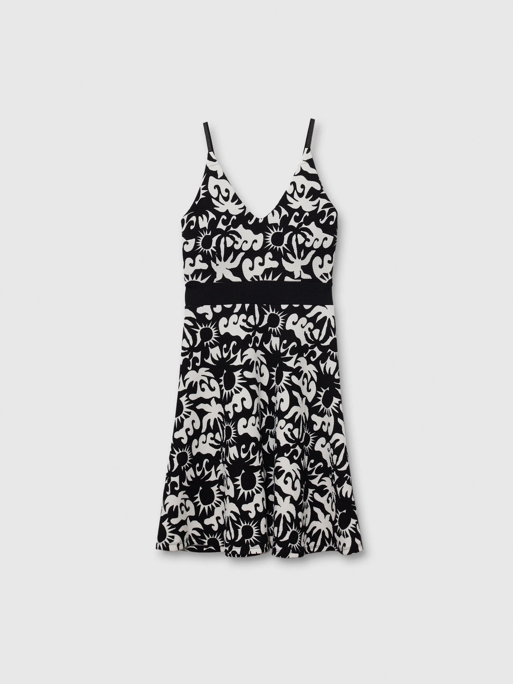 Tropical black and white short dress with adjustable straps, V-neck, and flattering cut for women, featuring a stylish design perfect for casual occasions and parties.
