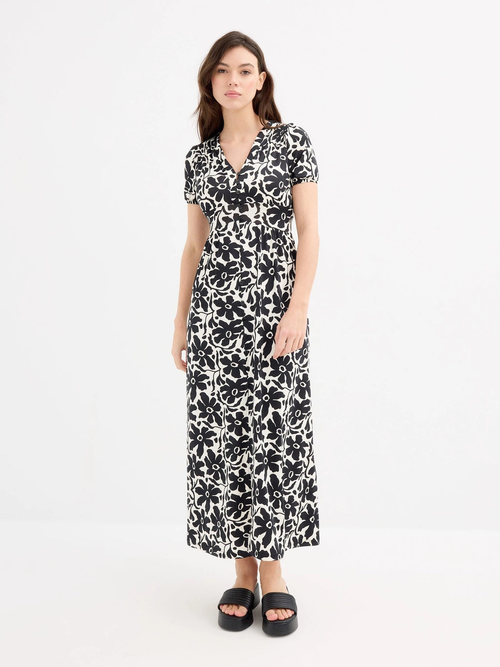 Maxi printed dress with V-neck and short sleeves by Inside, made from soft polyester-elastane blend, featuring button front closure and partially exposed back, perfect for casual everyday wear, ideal for women looking for sty